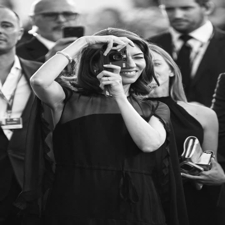 Sofia Coppola taking a photo