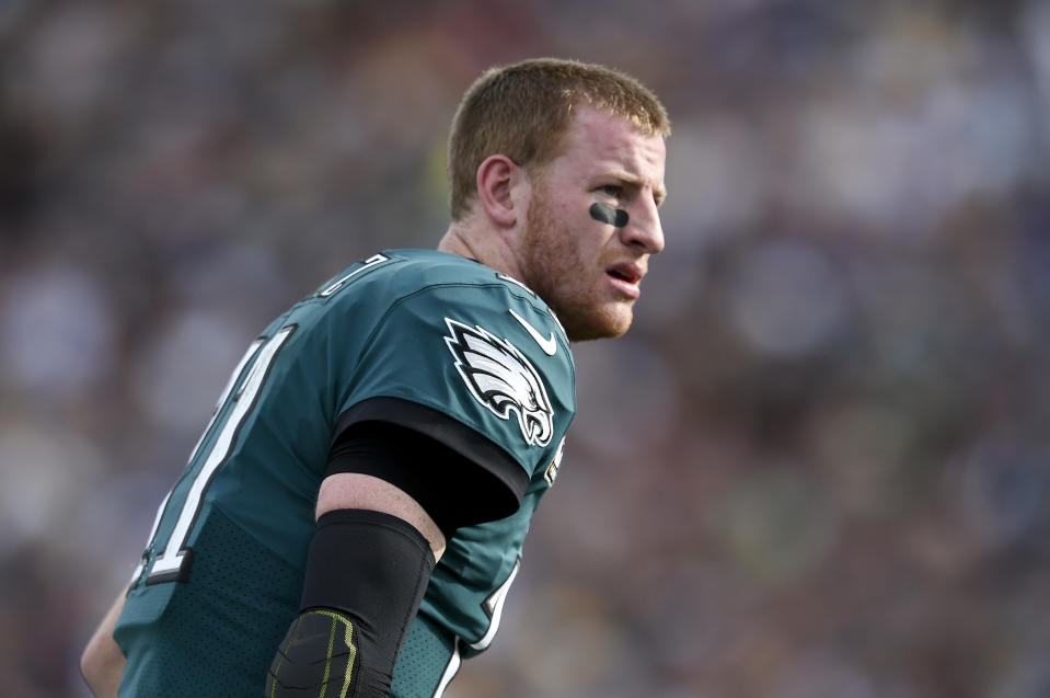 Philadelphia Eagles quarterback Carson Wentz is done for the season after tearing his ACL. (AP)