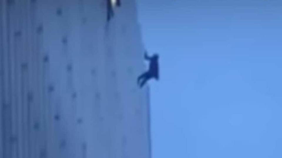 Traffic in Chicago was blocked off Sunday after a man dangled from a rope on the side of the Chicago Trump Tower demanding to speak to President Donald Trump, a stand-off that ended after 13 hours.