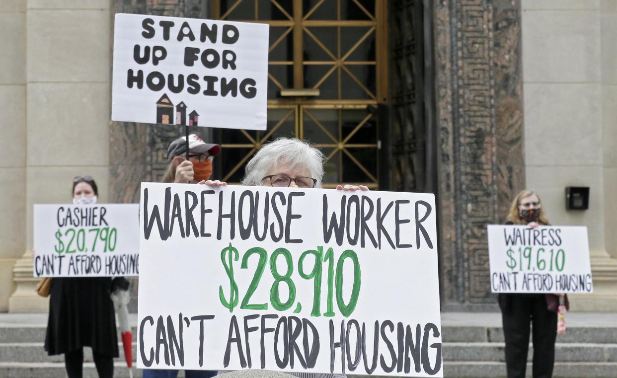 Advocates for low-wage workers demonstrated at City Hall in downtown Columbus on Thursday, May 28, 2020, calling for more affordable housing and assistance for those facing eviction due to the coronavirus pandemic.