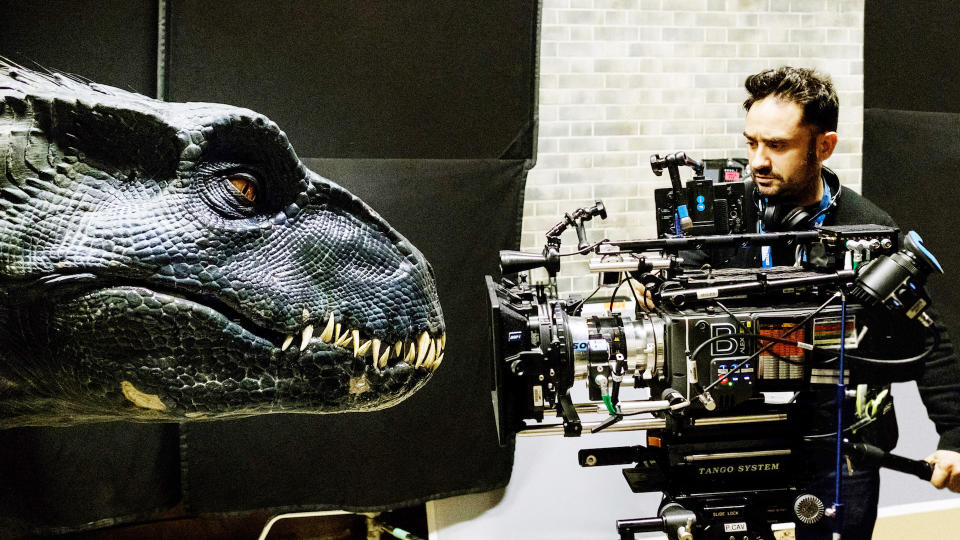 Director J.A. Bayona with a deadly new dinosaur, the Indoraptor. This new dinosaur hybrid is the boogeyman during an extended “haunted house” sequence in <i>Jurassic World: Fallen Kingdom</i>. (Photo: Universal)