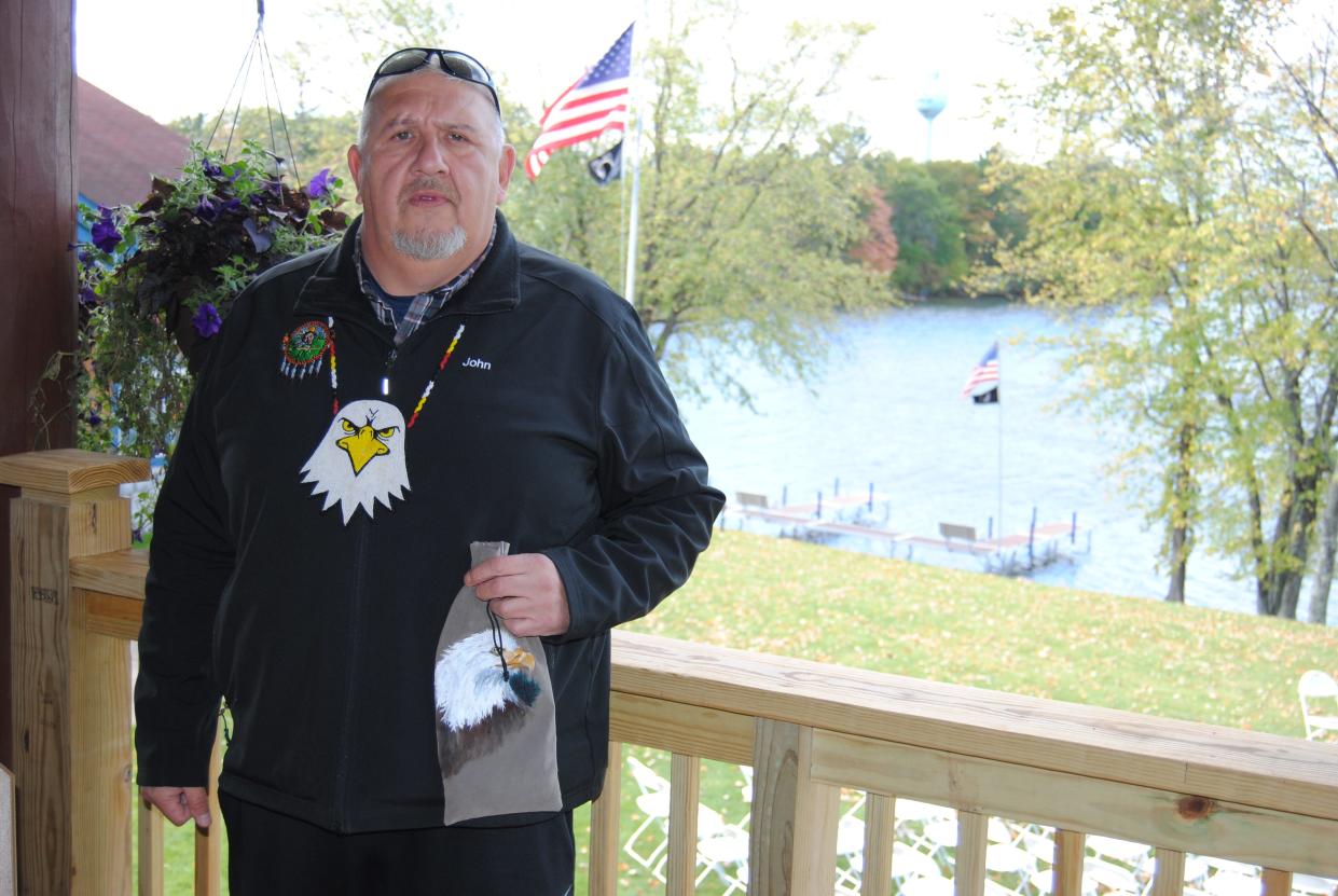 Lac du Flambeau Tribe President John Johnson looks out onto Pokegama Lake from the tribe's hotel casino balcony on the tribe's reservation in northern Wisconsin.