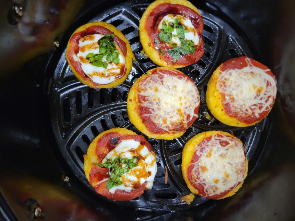 polenta topped with cheese and sauce in air fryer