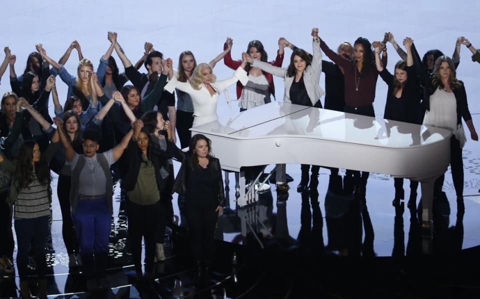 <div class="inline-image__caption">Lady Gaga holds hands with survivors of sexual abuse after singing her Oscar-nominated song "Til It Happens to You" at the 88th Academy Awards in Hollywood, California February 28, 2016. Vice President Joe Biden made a special appearance at the Oscars ceremony on Sunday to advocate for victims of sexual assault and introduced a powerful performance by Lady Gaga that featured survivors of sexual abuse. REUTERS/Mario Anzuoni - TB3EC2T0ICV7E</div> <div class="inline-image__credit">REUTERS</div>