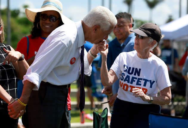 Rep. Charlie Crist (D-Fla.), a candidate for Governor of Florida, greets Betsy Golland during a vigil at the Sunrise Amphitheater on May 28, 2022, in Sunrise, Florida. (Photo: Joe Raedle via Getty Images)