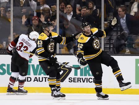 Dec 7, 2017; Boston, MA, USA; Boston Bruins right wing David Backes (42) celebrates with center Danton Heinen (43) after scoring his second goal of the game during the second period against the Arizona Coyotes at TD Garden. Mandatory Credit: Winslow Townson-USA TODAY Sports