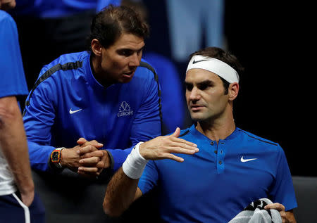 Tennis - Laver Cup - 3rd Day - Prague, Czech Republic - September 24, 2017 - Roger Federer and Rafael Nadal of team Europe react during the match. REUTERS/David W Cerny