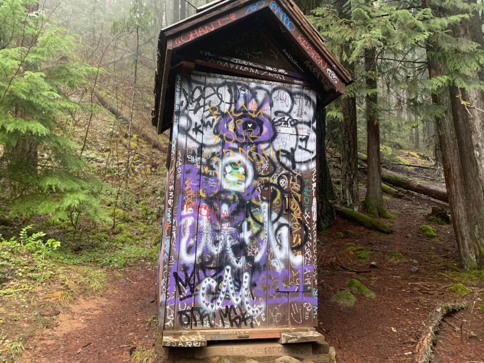 Graffiti is printed on many buildings around Umpqua Hot Springs.