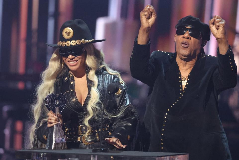Beyonce with Stevie Wonder at the iHeartRadio Music Award (REUTERS)