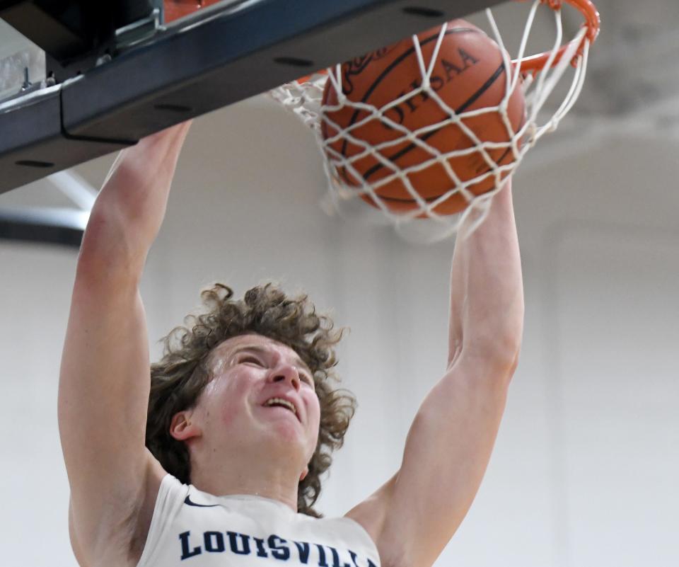 Louisville's Will Aljancic dunks in the second quarter of Ellet at Louisville Boys Basketball.  Saturday,  January, 21, 2023.