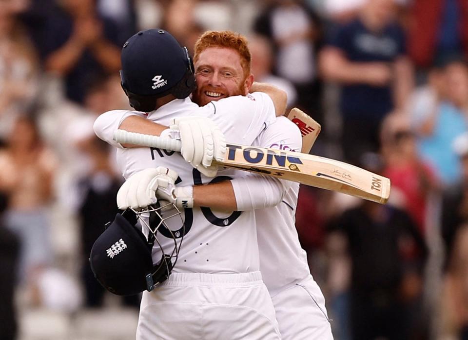 Root and Bairstow embrace after an undefeated stand of 269 (Action Images/Reuters)