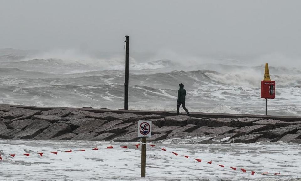 The 61st Street fishing pier at Galveston Beach as the outer bands of Hurricane Delta pass through Galveston, Texas.