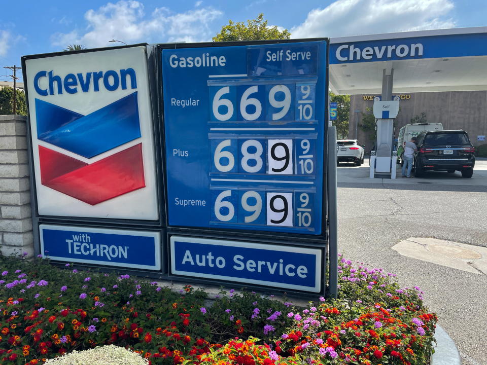 Gas prices are advertised at a Chevron station as rising inflation and oil costs affect the consumers in Los Angeles, California, U.S., June 13, 2022. REUTERS/Lucy Nicholson