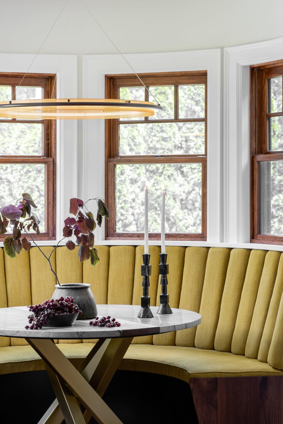 Each of the channels in the breakfast nook seating area is removable, allowing for easy replacement in this Dutch Colonial Revival home in Audubon Park that was built in 1930.