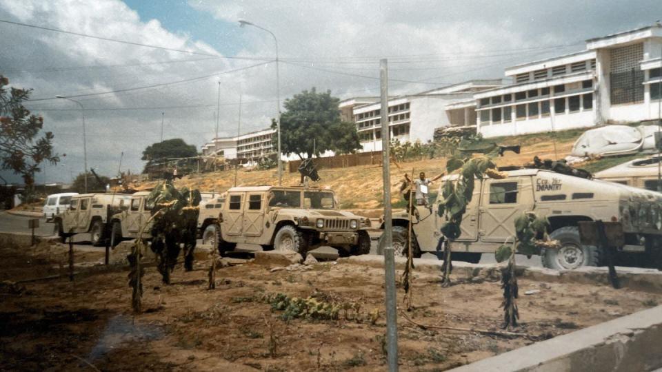Humvees of 3rd Platoon lined up outside Mogadishu University, their home during their 1993 deployment to Somalia. (Photo courtesy of Bryan Puckett)