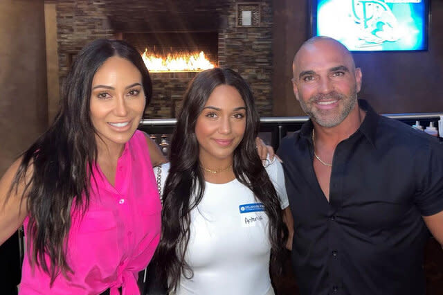 Melissa Gorga, Joe Gorga, and Antonia Gorga pose for a photo together.