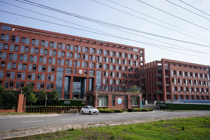 The Wuhan Institute of Virology, a large brick building.