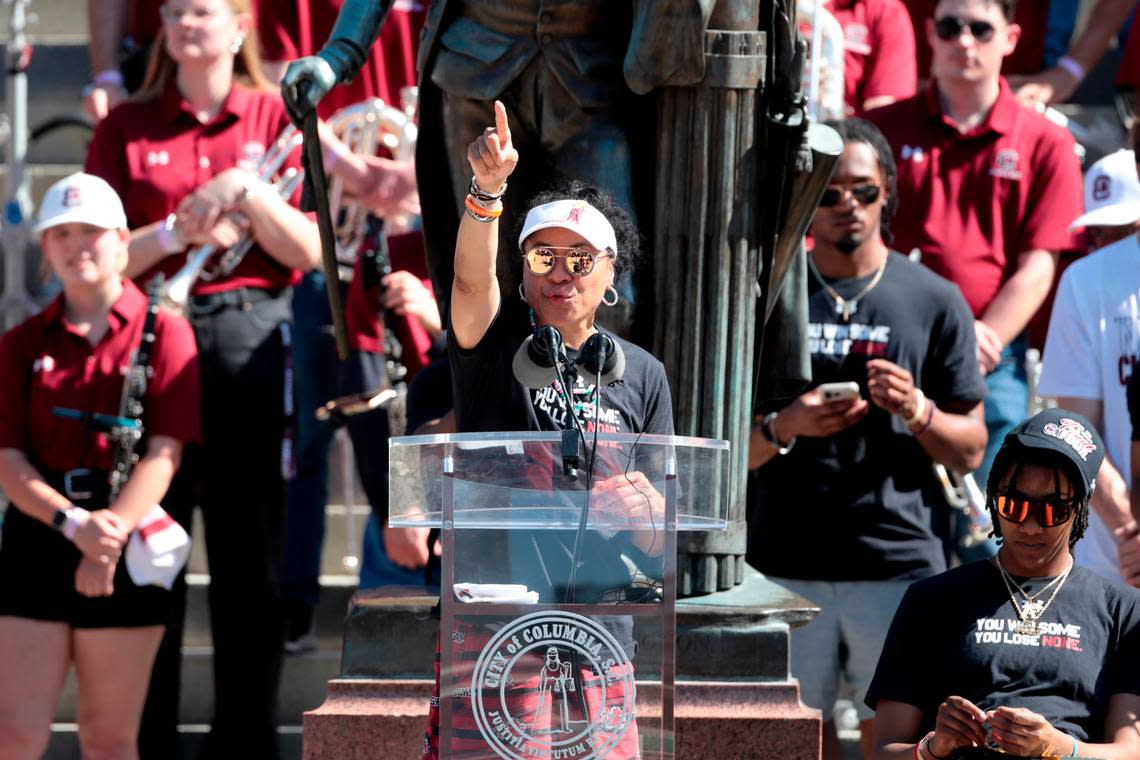 University of South Carolina Head Coach Dawn Staley acknowledges the fans after a parade through downtown Columbia and a ceremony at the South Carolina State House on Sunday, April 14, 2024. The Gamecocks women’s basketball team won the National Championship after having an undefeated season.