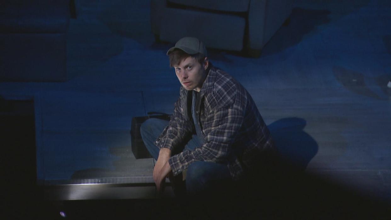 Zach Faye portrays Aaron, a fisherman struggling with his emotions after a disaster, in Downed Hearts.  (CBC - image credit)