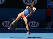 Johanna Larsson of Sweden serves to Victoria Azarenka of Belarus during their women's singles match at the Australian Open 2014 tennis tournament in Melbourne January 14, 2014. REUTERS/Petar Kujundzic