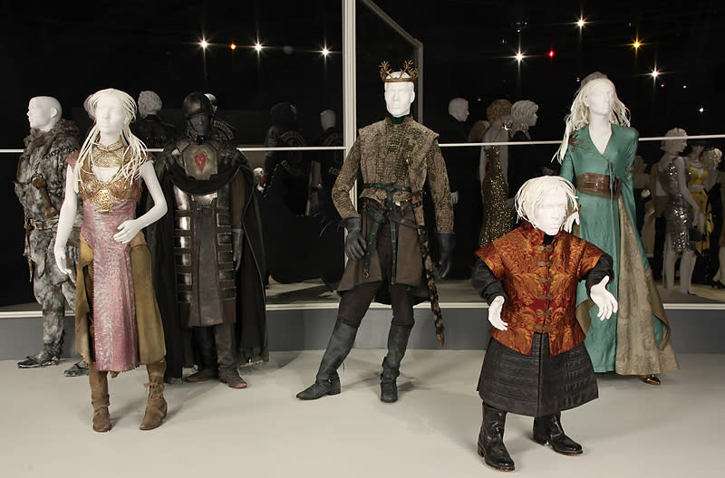 In this publicity photo provided by Fashion Institute of Design & Merchandising, costumes from the TV show, "Game of Thrones," are shown in the exhibit "The Outstanding Art of Television Costume Design" at FIDM in Los Angeles. “Game of Thrones” is nominated for 2012 Emmy® for Outstanding Costume Design by Costume Designer, Michele Clapton, Assistant Costume Designer, Alexander Fordham and Assistant Costume Designer, Chloe Aubry. The exhibition runs from July 31 through October 20, 2012.(AP Photo/FIDM, Alex J. Berliner)