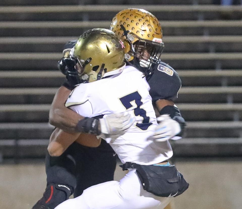 Shelby's Malaki Hamrick brings down a Reidsville runner during Friday's Class 2A playoff matchup at George Blanton Memorial Stadium.