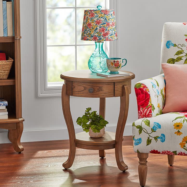 <p><a href="https://go.redirectingat.com?id=74968X1596630&url=https%3A%2F%2Fwww.walmart.com%2Fip%2FThe-Pioneer-Woman-End-Table-Teal%2F3385432425&sref=https%3A%2F%2F" rel="nofollow noopener" target="_blank" data-ylk="slk:Shop Now;elm:context_link;itc:0;sec:content-canvas" class="link rapid-noclick-resp">Shop Now</a></p><p>The Pioneer Woman End Table in Brown</p><p>$144.00</p>