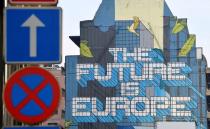 FILE PHOTO: A wall mural is seen near the EU Commission and Council buildings in Brussels, Belgium