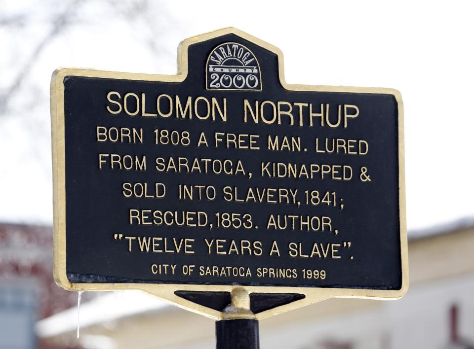 A Solomon Northup historical marker is seen on Thursday, March 13, 2014, in Saratoga Springs, N.Y. Northup was the author of "Twelve Years a Slave." (AP Photo/Mike Groll)