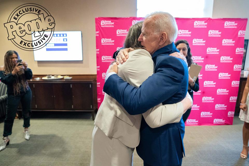Biden hugs a transgender woman at the Planned Parenthood Forum at the University of South Carolina Alumni Center on June 22, 2019.