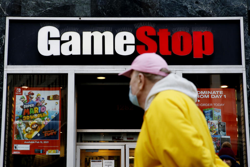 NEW YORK, NEW YORK - FEBRUARY 25: A man looks at GameStop at 6th Avenue on February 25, 2021 in New York. GameStop Corp. doubled its shares and and jumped another 19 percent today and the betting are that GameStop shares would spike to $800 on Friday. (Photo by John Smith/VIEWpress via Getty Images)