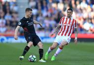 <p>James Milner clears the danger for Liverpool</p>