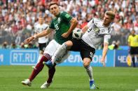 <p>Mexico’s midfielder Hector Herrera (L) vies with Germany’s forward Timo Werner during the Russia 2018 World Cup Group F football match between Germany and Mexico at the Luzhniki Stadium in Moscow on June 17, 2018. (Photo by Yuri CORTEZ / AFP) </p>