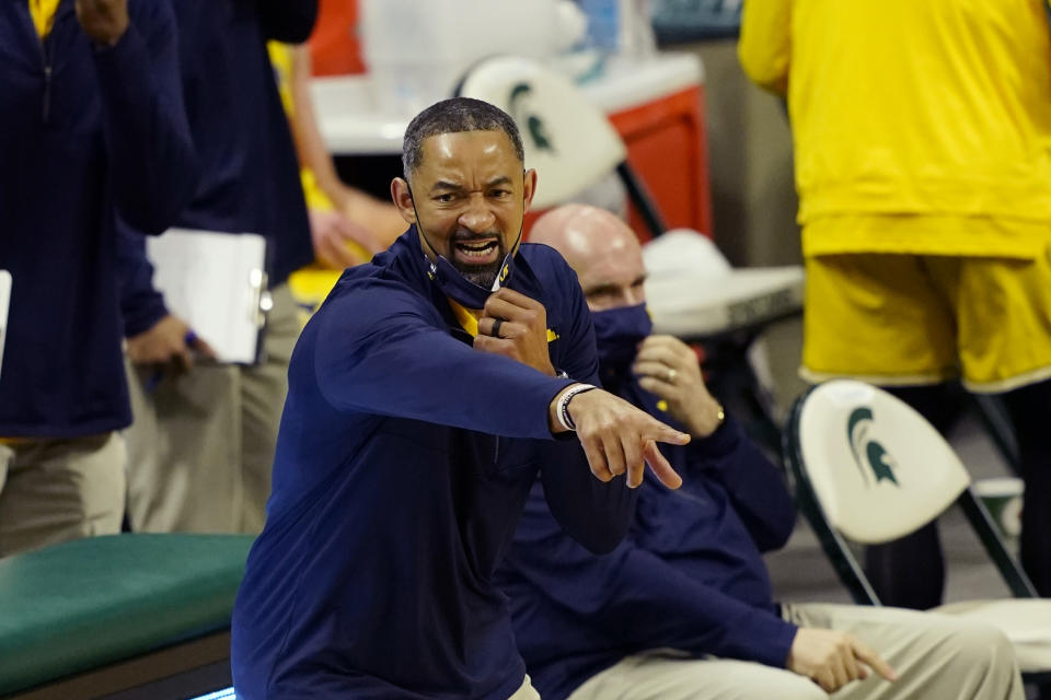 Michigan head coach Juwan Howard yells from the sideline during the first half of an NCAA college basketball game against Michigan State, Sunday, March 7, 2021, in East Lansing, Mich. (AP Photo/Carlos Osorio)