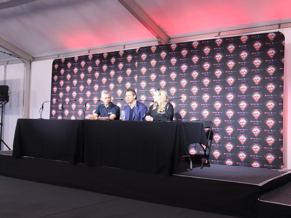 UKSA's Ian Annett, Virgin Orbit CEO Dan Hart, and Spaceport Head Melissa Thorpe sit on panel at press conference.