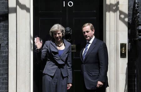 Britain's Prime Minister Theresa May (L) poses for the media with Ireland's Taoiseach Enda Kenney in Downing Street in London, Britain June 26, 2016. REUTERS/Neil Hall