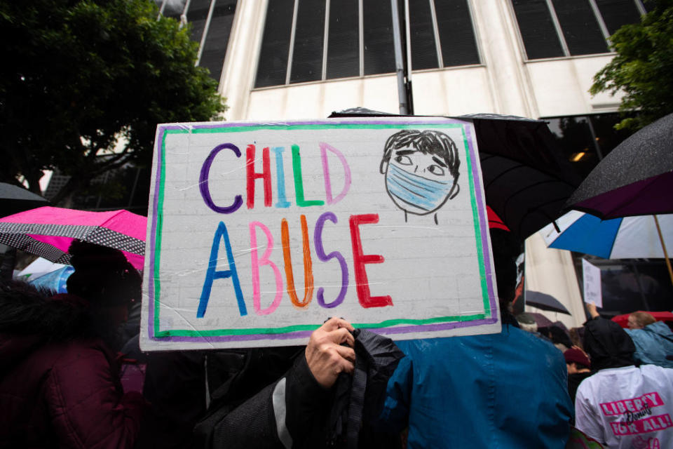 Dec. 14, 2021: Los Angeles Parents opposed to LAUSD’s student vaccine mandate rally outside the district office during a school board meeting. (Sarah Reingewirtz / Getty Images)