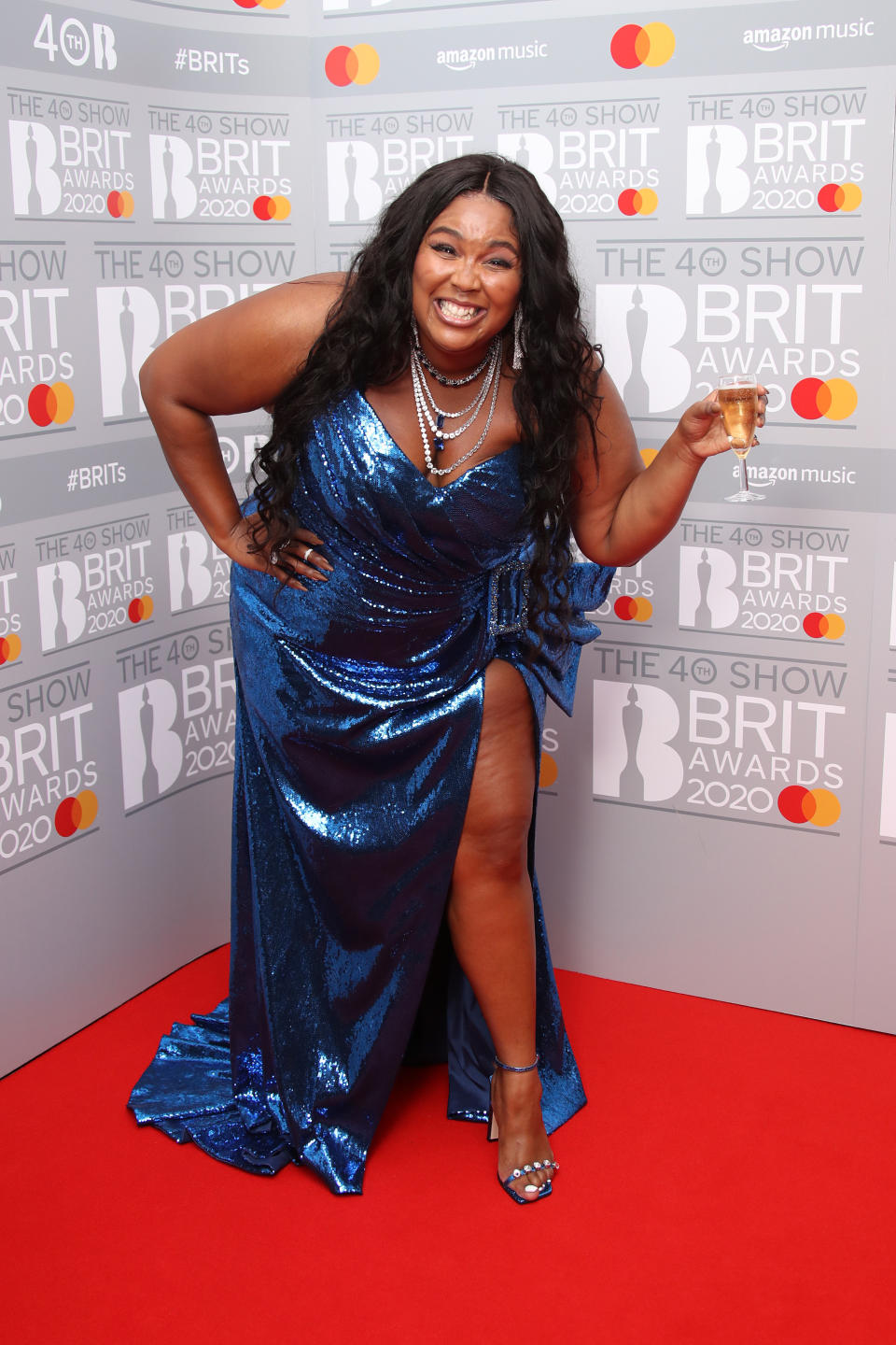 LONDON, ENGLAND - FEBRUARY 18: (EDITORIAL USE ONLY) Lizzo poses in the winners rooms at The BRIT Awards 2020 at The O2 Arena on February 18, 2020 in London, England. (Photo by Mike Marsland/WireImage)