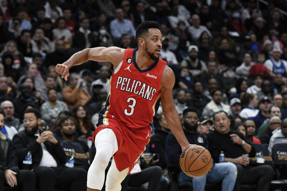 New Orleans Pelicans guard CJ McCollum (3) goes to the basket during the first quarter of an NBA basketball game against the Washington Wizards, Monday, Jan. 9, 2023, in Washington. (AP Photo/Terrance Williams)