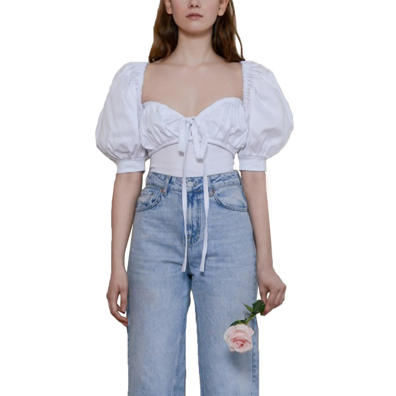 <a rel="nofollow noopener" href="https://oliviarosethelabel.com/shop/the-greta-top-white/%20" target="_blank" data-ylk="slk:The Greta Top, Olivia Rose The Label, $161This on-the-rise British label handmakes every piece from fabrics locally sourced in the UK.;elm:context_link;itc:0;sec:content-canvas" class="link ">The Greta Top, Olivia Rose The Label, $161<p>This on-the-rise British label handmakes every piece from fabrics locally sourced in the UK.</p> </a>