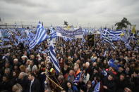 Protesters wave Greek national flags during a rally against the use of the term "Macedonia" in any solution to a dispute between Athens and Skopje over the former Yugoslav republic's name, in the northern city of Thessaloniki, Greece, January 21, 2018. REUTERS/Alexandros Avramidis