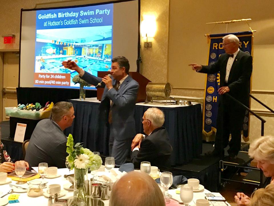 As pictured in this photo from a past event, a live auction will take place at the Rotary's 36th Annual Gala on May 20.