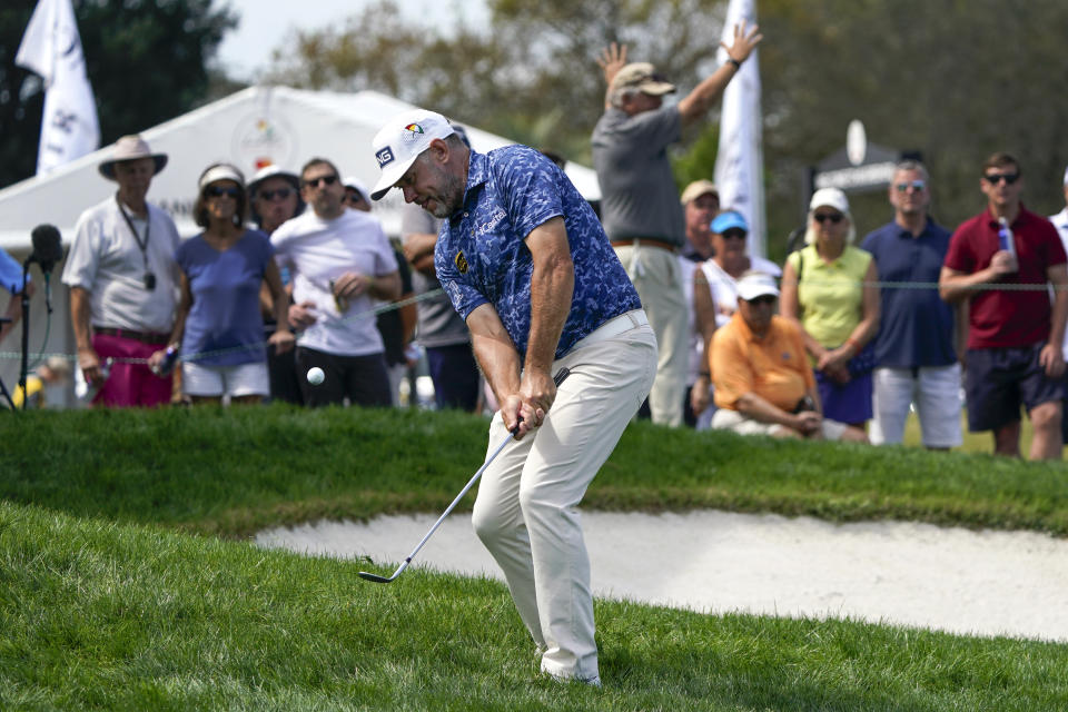 Lee Westwood, of England, hits a chip shot to the eighth green during the first round of the Arnold Palmer Invitational golf tournament Thursday, March 3, 2022, in Orlando, Fla. (AP Photo/John Raoux)