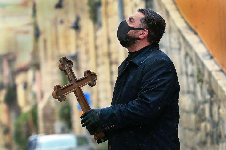 ISRAEL-PALESTINIAN-HEALTH-VIRUS-CHRISTIANS-EASTER