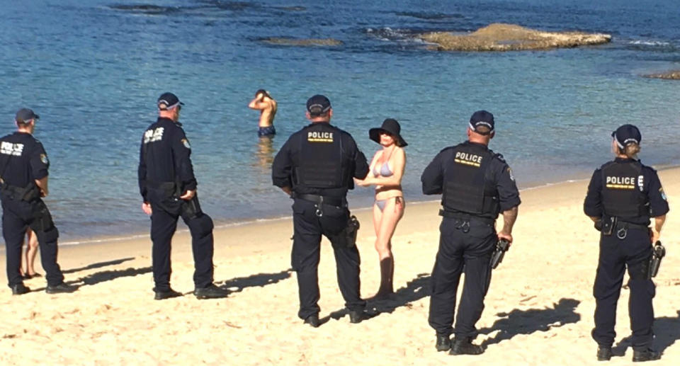 Mum reveals moment she was confronted by five police on beach