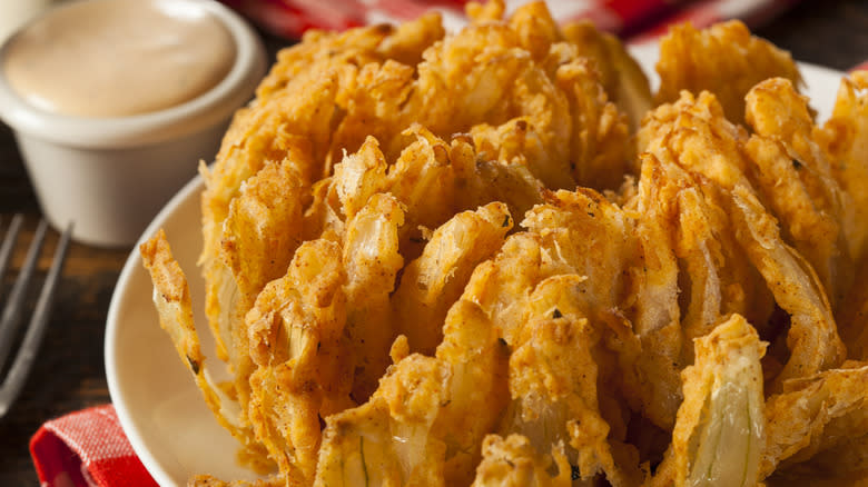 Bloomin' Onion with dipping sauce