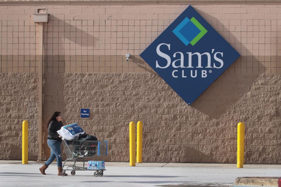 A shopper stocks up on merchandise at a Sam's Club store on January 12, 2018 in Streamwood, Illinois.