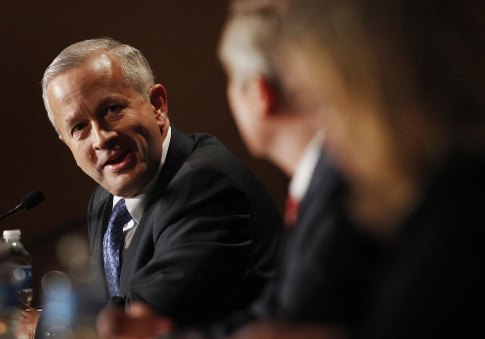 FILE - In this Saturday, Feb. 18, 2012 file photo, Senate candidate John Brunner speaks to the other candidates during a forum at a Republican conference in Kansas City, Mo. Brunner, the former CEO and chairman of health and beauty care giant Vi-Jon Inc., has forced his way into a three-way battle featuring a congressman and a former state treasurer that will be decided Tuesday, Aug. 7. (AP Photo/Orlin Wagner, File)