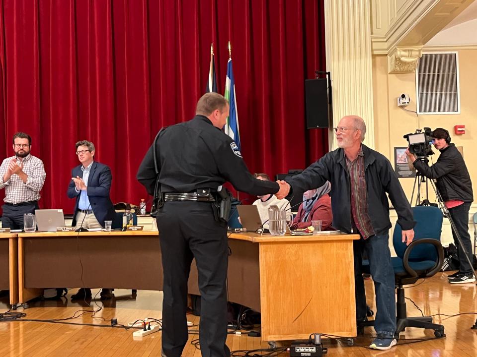 Chief Jon Murad shakes hands with Burlington city councilors after his appointment is approved. The council approved of Murad's appointment as chief during their meeting on June 5, 2023.