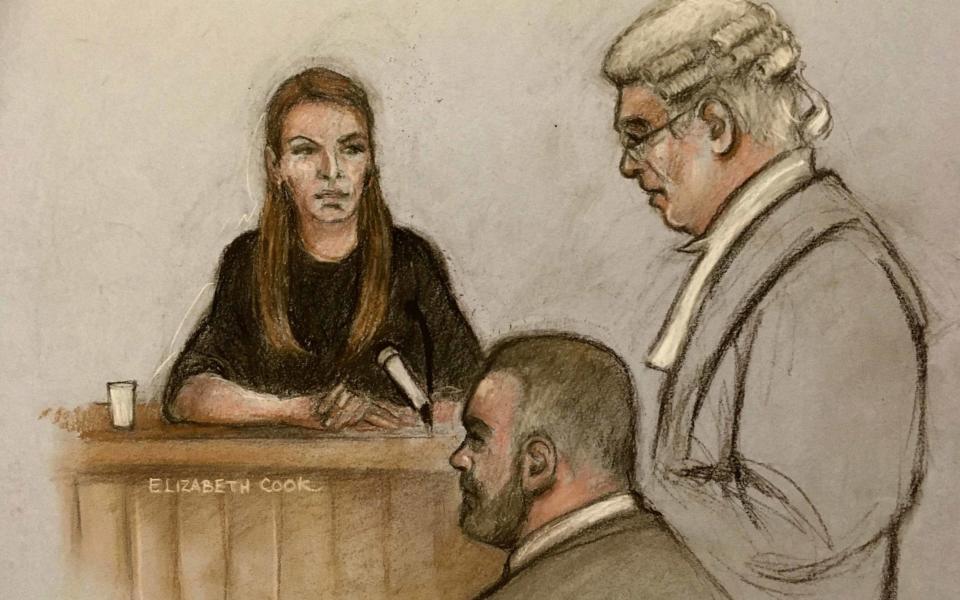 Court artist sketch by Elizabeth Cook of Coleen Rooney, watched by her husband Wayne, as she gives evidence at the Royal Courts Of Justice - Elizabeth Cook/PA Wire